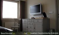 flatscreen tv benb koffiezet kamer