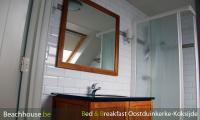 badkamer met grote spiegel
